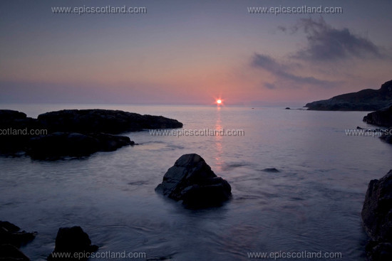 Image: Dawn over the Little Minch, the expanse of water that seperates 
                  mainland scotland and the Isle of Skye from the Isle of Harris.